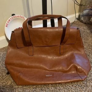 Kenneth Cole’s Reaction Leather Purse